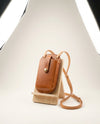 Handmade leather phone bag with shoulder strap